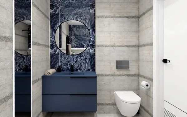 Nowoczesna granatowa łazienka inspiracje: beton, marmur i elegancka szafka.